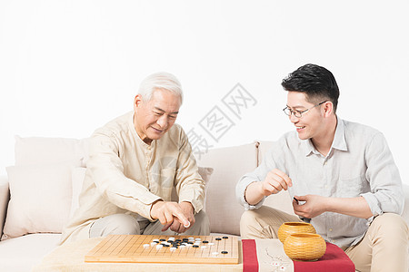 孝顺老年父子下棋背景