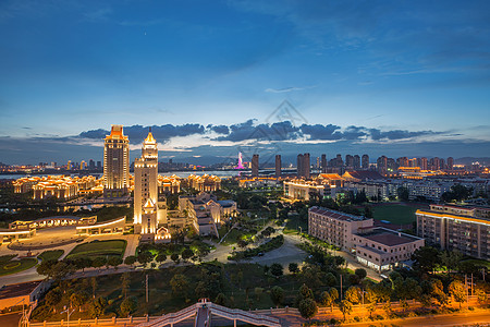 校园鸟瞰图厦门集美大学华灯初放背景