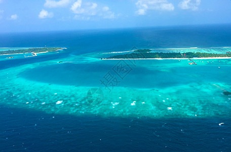 马尔代夫水上飞机马尔代夫水飞航拍背景