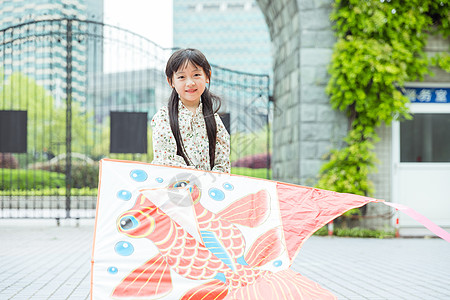 小女孩放风筝图片