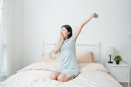 居家生活女性生活起床背景