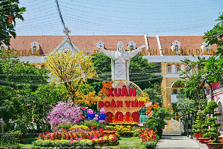 越南粉教堂后花园耶稣像背景图片