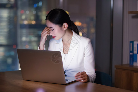 加班疲劳商务女士办公室加班背景