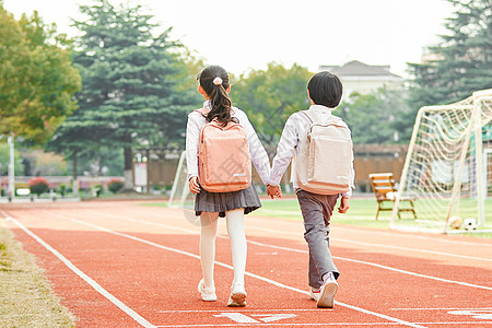 散步背影小学生放学背景