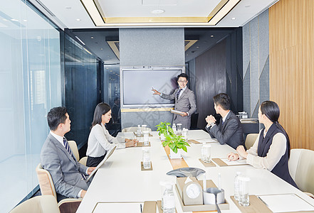 公安工作汇报片头商务团队在会议室开会背景