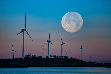二次曝光风车与月亮背景