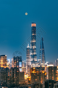 海南夜景月色下的上海三件套背景