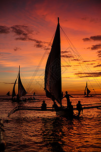 帆船剪影长滩帆船海上日落背景