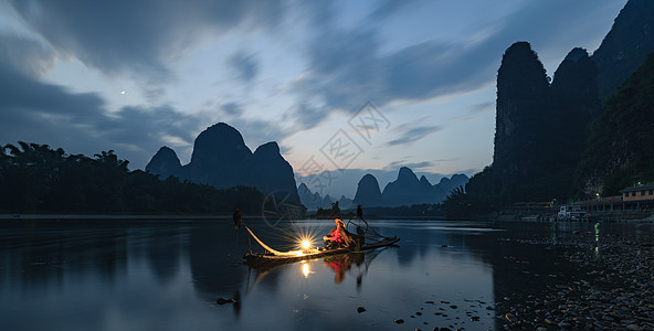 黄姚古镇夜景漓江渔火背景