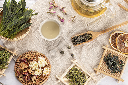 普洱菊花茶茶叶与茶具背景