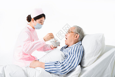 老年人吃饭护士照顾老人吃饭背景