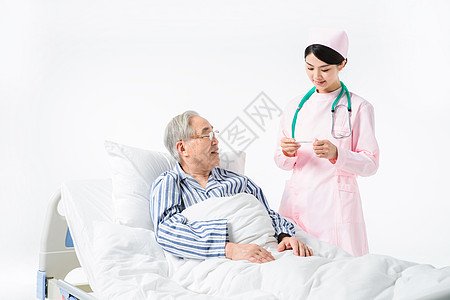 护士给老人量体温背景图片
