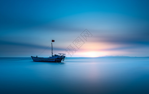 夕阳海边海岸风光背景