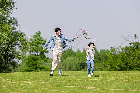 父子拥抱父子放风筝背景