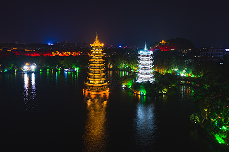 桂林航拍日月双塔夜景背景图片