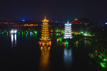 桂林航拍日月双塔夜景背景图片