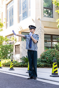 保安室保安指挥交通背景