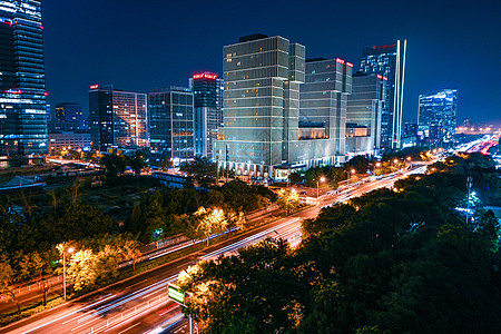 楼科技北京万达广场夜晚车轨背景