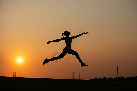 瑜伽室瑜伽女性夕阳剪影背景