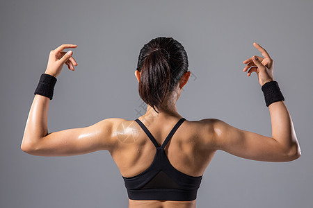 运动女性背部肌肉背景图片