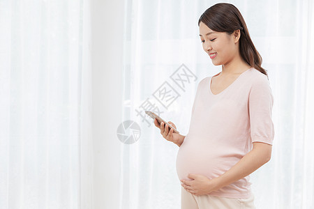孕妇看手机图片