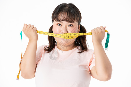 胖女孩节食肥胖体脂比高清图片