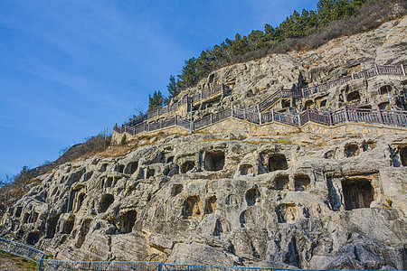 河南洛阳龙门石窟石佛雕像背景