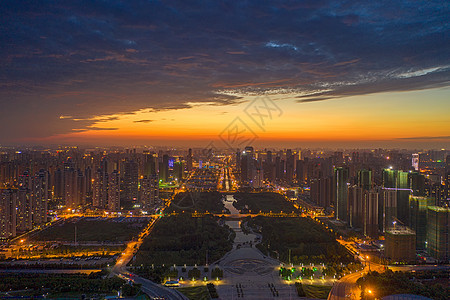 江西九江城市中轴线夕阳晚霞天空夜景图片