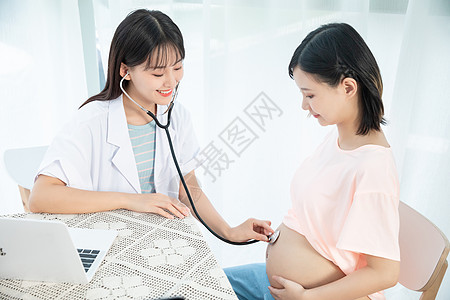 孕妇肚子矢量孕妇医生听诊器背景