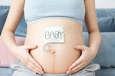 孕妇肚子便利贴背景图片