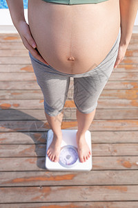 孕期体重孕妇称体重背景