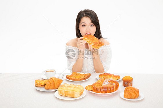 美女吃面包图片