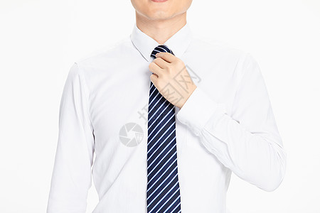 商务男性整理领带背景图片