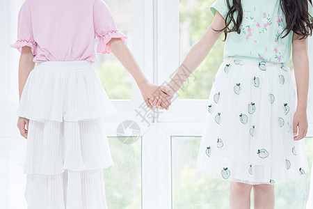 闺蜜小女孩小闺蜜牵手特写背景