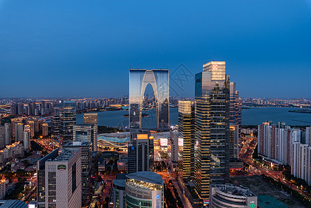 城市夜景俯瞰苏州园区东方之门建筑群背景