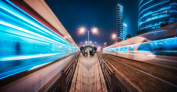 城市建筑科技感夜景光谷有轨电车背景