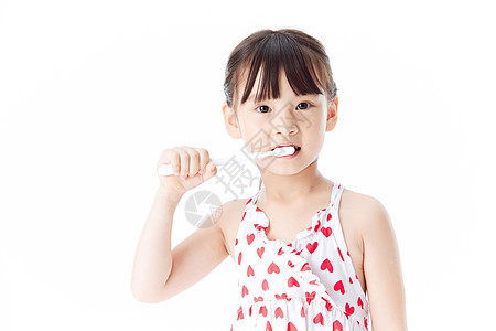 可爱小女孩拿牙刷刷牙高清图片