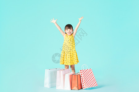 购物的小女孩小女孩购物背景