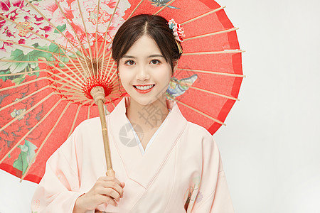 日本 和服和服美女手撑油纸伞背景