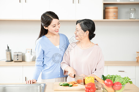 母女做饭母女厨房切菜背景