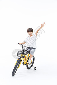 小男孩骑单车背景图片