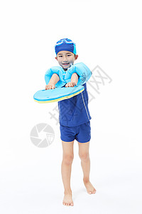 游泳少年手拿浮板图片