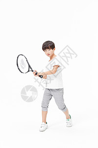 小男孩打网球图片