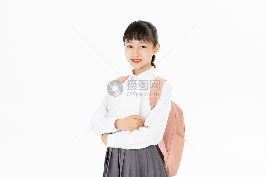 中学生女孩抱着书本图片