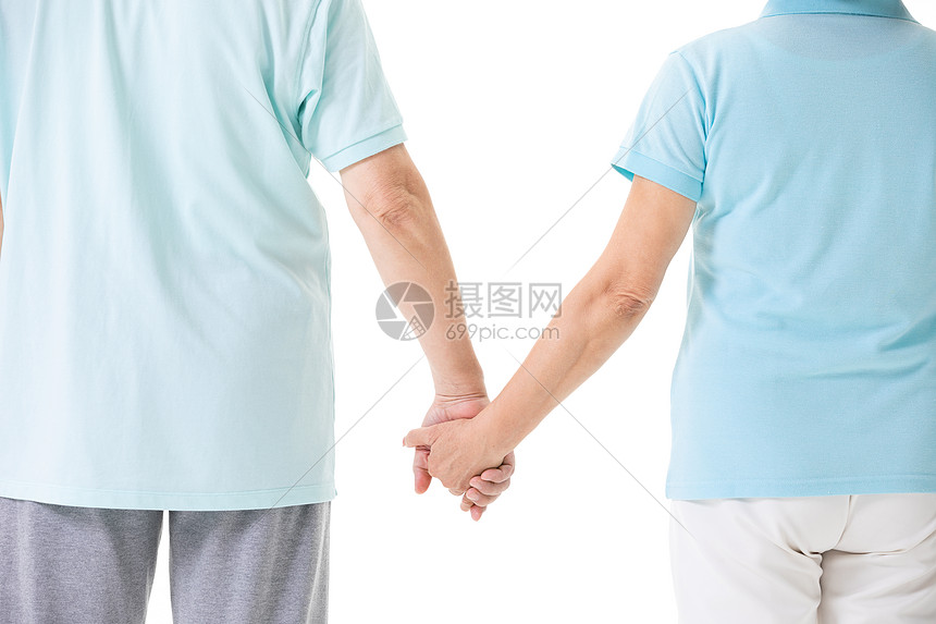 老年夫妇牵手背影图片