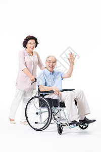 老年人推轮椅图片