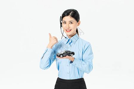 商务女性拿小汽车图片