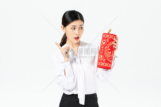 商务美女拿新年挂件迎新年图片