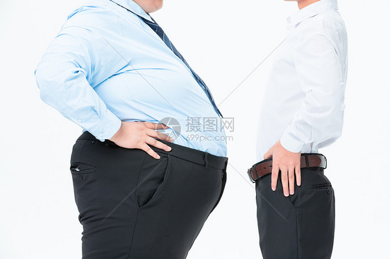 肥胖商务男性比肚子图片
