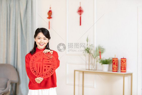 新年女性手拿福图片